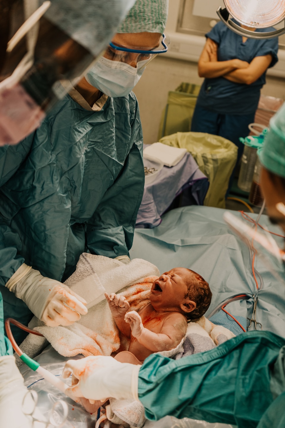 Newborn baby receiving neonatal care